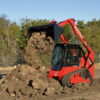 Manitou 1650 RT – chargeuse compacte   – en situation d'utilisation