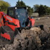 Manitou 1650 RT – chargeuse compacte – en situation d'utilisation n°2