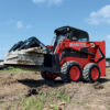 Manitou 1650 R – chargeuse compacte – en situation d'utilisation n°4